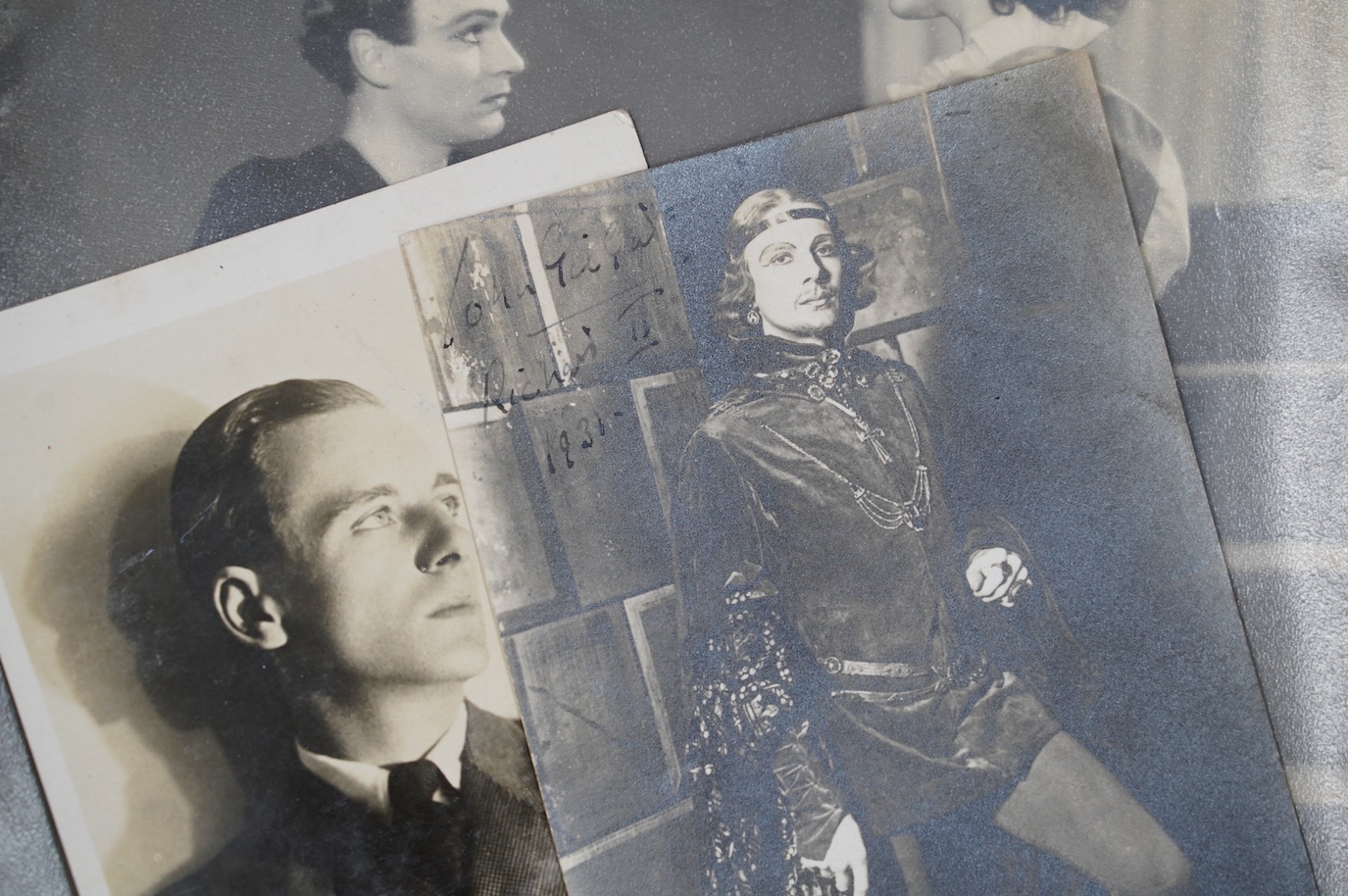 A theatrical archive of signed photos, a poster and books relating to John Gielgud and Laurence Olivier, including; a framed signed photograph of John Gielgud as Hamlet dated 1935, together with two signed photographs da